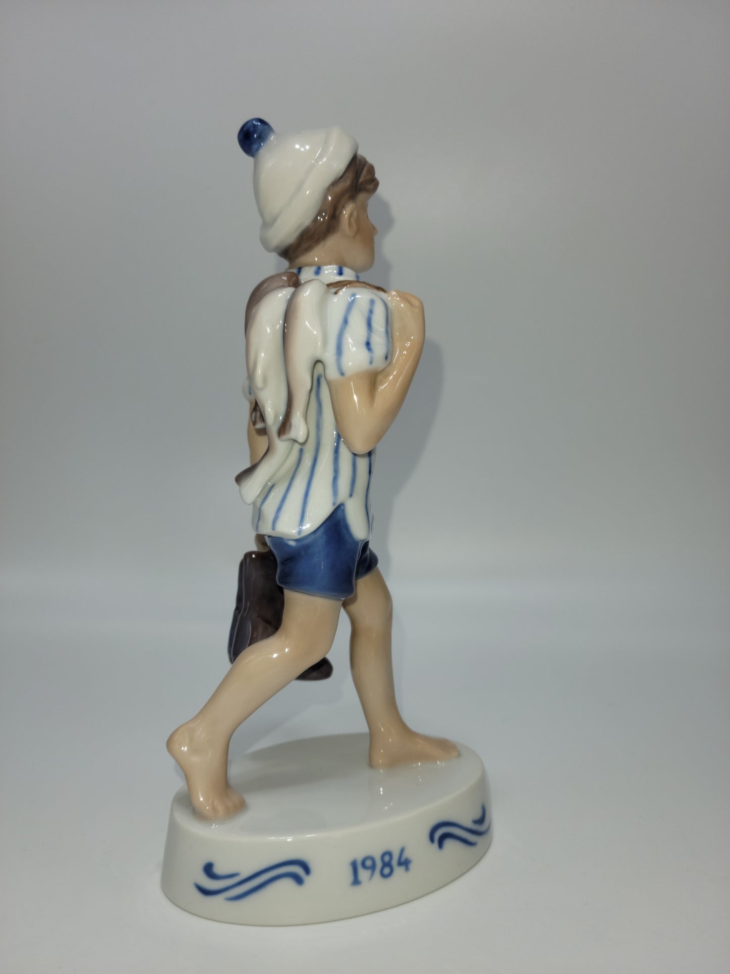 Bing And Grondahl Figurine Of The Year 1984 Peter with Barefeet and Fish by Soren Brunoem - Grannies Garage
