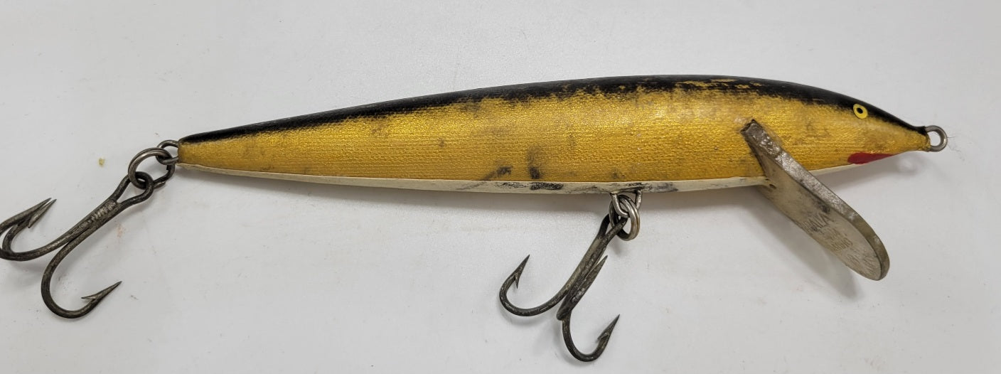 RAPALA MAGNUM FLOATING #18 BLACK, GOLD, WHITE AND RED WITH YELLOW AND BLACK EYES IS GREAT FOR THOSE BIG FISH