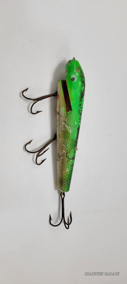 LARGE 8" GREEN, RED, GOLD AND OFF WHITE FISHING LURE WITH BLACK AND WHITE EYES AND RED MOUTH