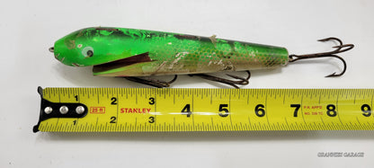 LARGE 8" GREEN, RED, GOLD AND OFF WHITE FISHING LURE WITH BLACK AND WHITE EYES AND RED MOUTH