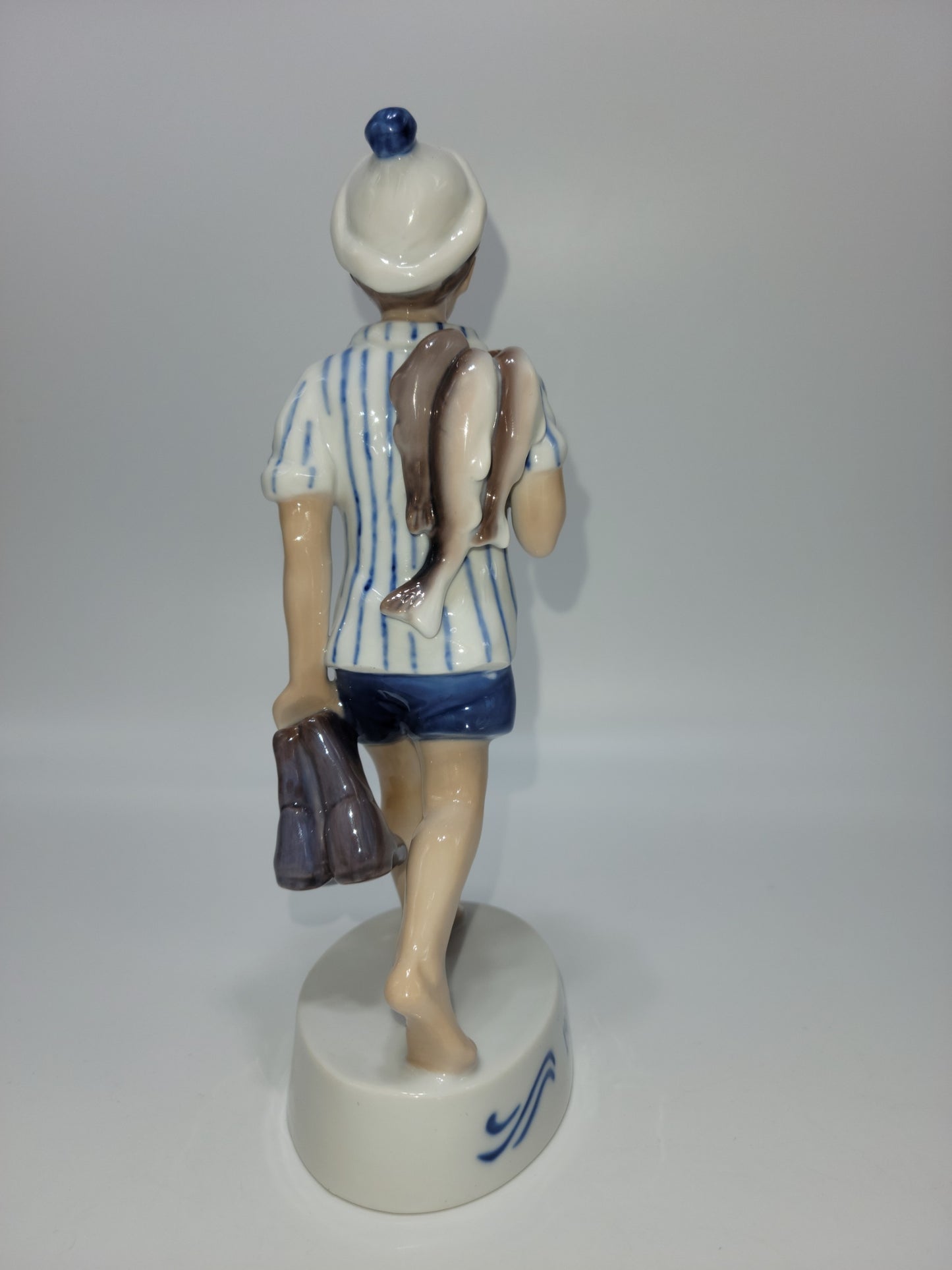 Bing And Grondahl Figurine Of The Year 1984 Peter with Barefeet and Fish by Soren Brunoem