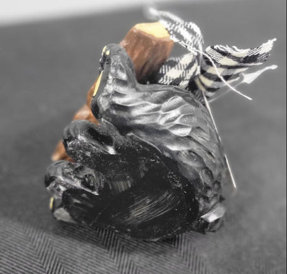 Close-up of the bottom of the bear figurine.