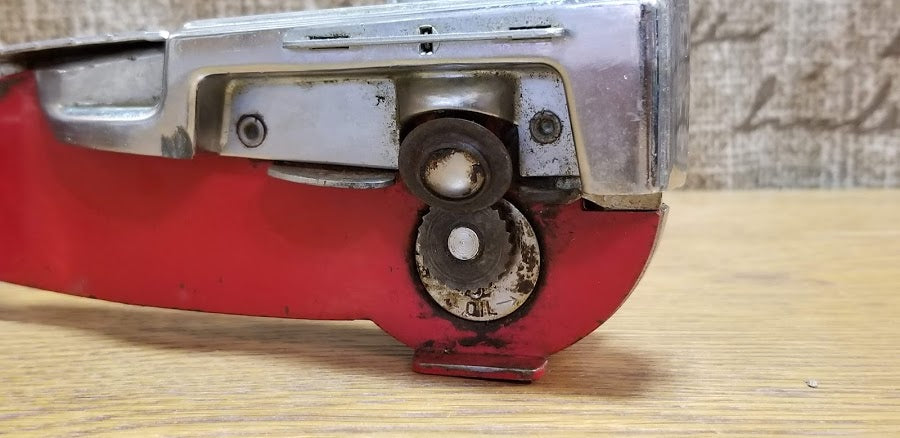 Old Red Can Opener
