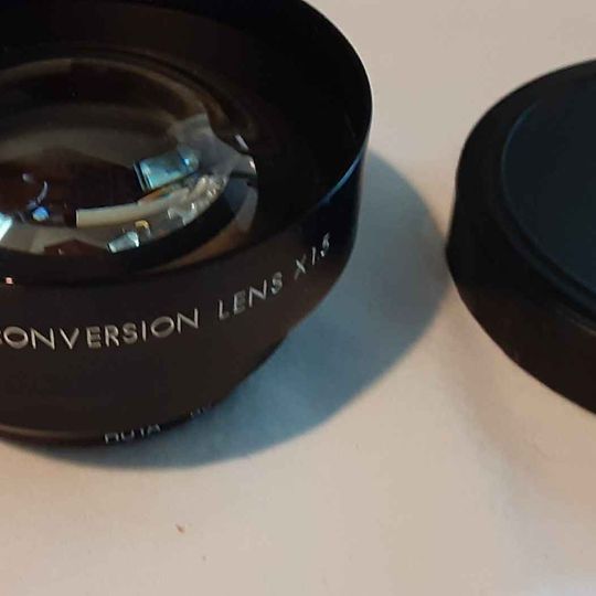 Camera -  Black TV camera Tele Conversion lens 1.5